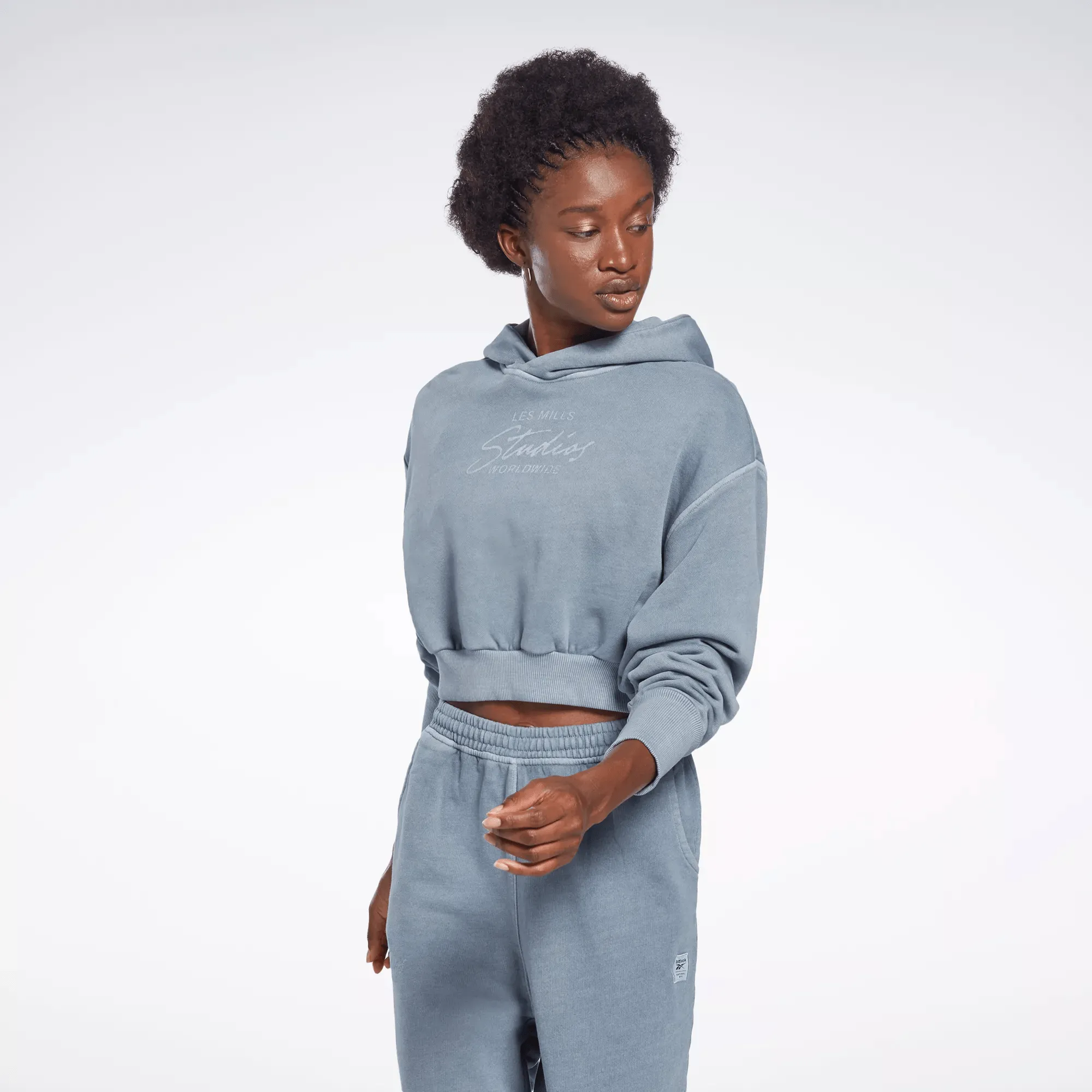Reebok Damen Les Mills Natural Dye Crop Hoodie Blau Reebok